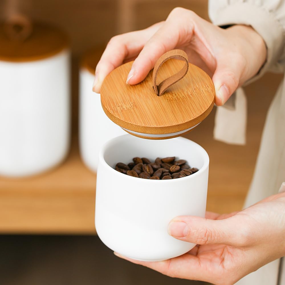YYW Kitchen Canister Set for Countertop Set of 3, 9/28/45 oz Ceramic Food Storage Containers with Airtight Wood Lids, Food Saver Jars for Coffee, Tea, Candy, Flour(Three-piece suit in white)