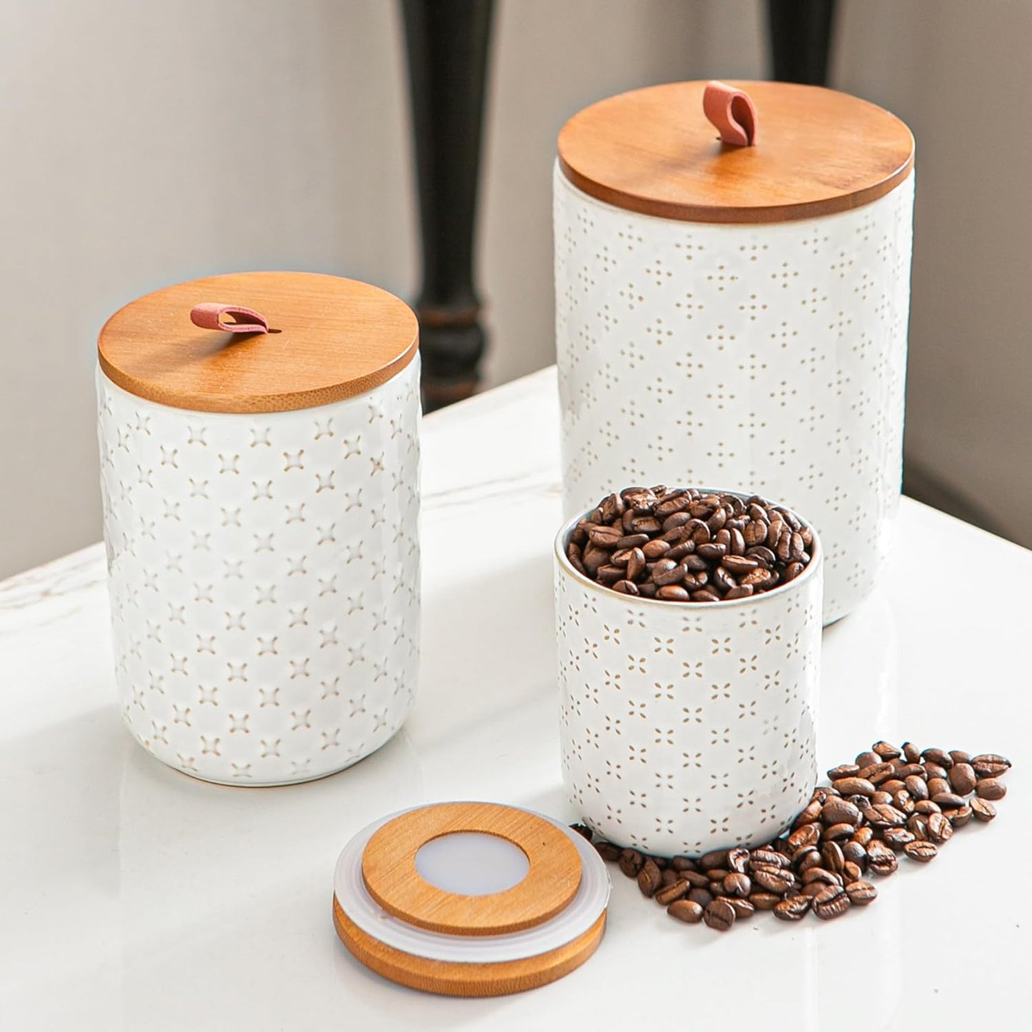 JOJUNO White Ceramic Canister Set with Wooden Lids – 3-Piece Airtight Food Storage Jars for Kitchen, Embossed Design, Small/Medium/Large Sizes (12/30/48 oz) – Flour, Sugar, Coffee, Tea Containers
