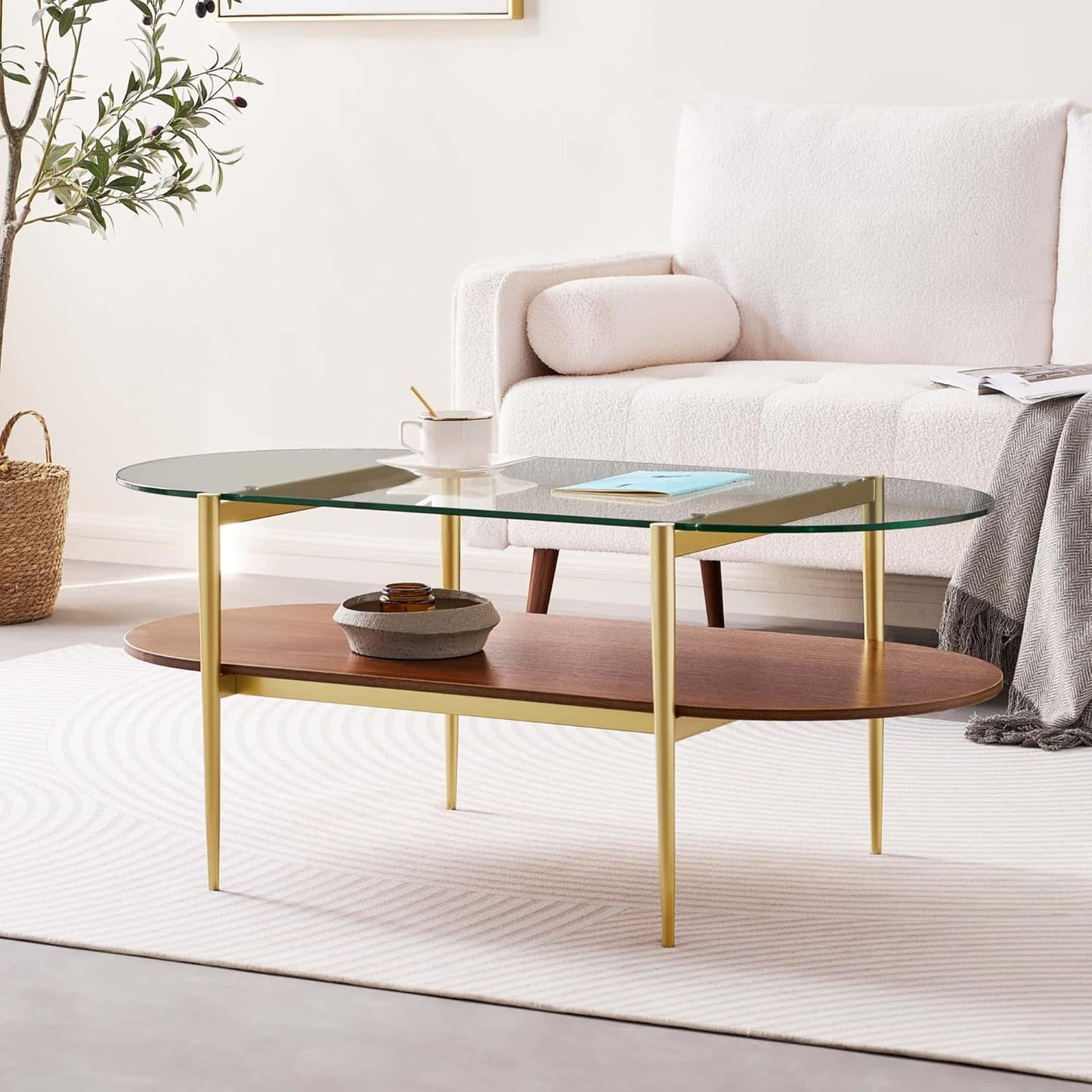 Oval Glass Coffee Table, Mid-Century Modern Design, L41 x W21 x H17 inch, for Living Room, 2-Tier Structure, Clear Glass Top and Walnut Finish Wood Shelf, Conical Legs with Gold Finish Frame