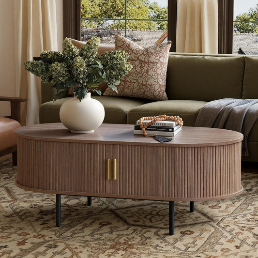 Mid Century Modern Coffee Table, 47.2" Oval Fluted Coffee Table with Storage and Sliding Doors, Minimalist Tea Table with Wood Grain Veneer, Retro Center Tables for Living Room, Walnut